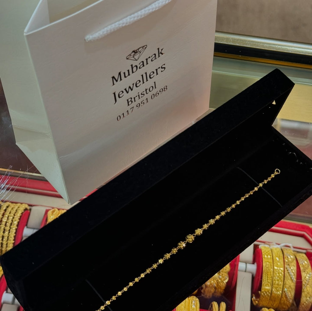 Floral Dainty Gold Bracelet — original Mubarak Jewellers photograph