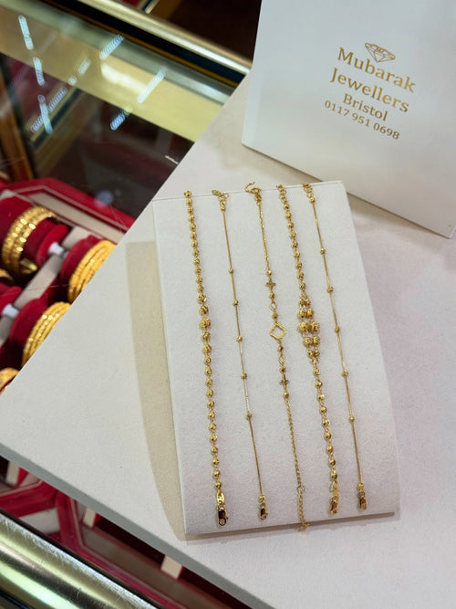 Celestial Station Gold Bracelet — original Mubarak Jewellers photograph